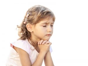 older girl praying